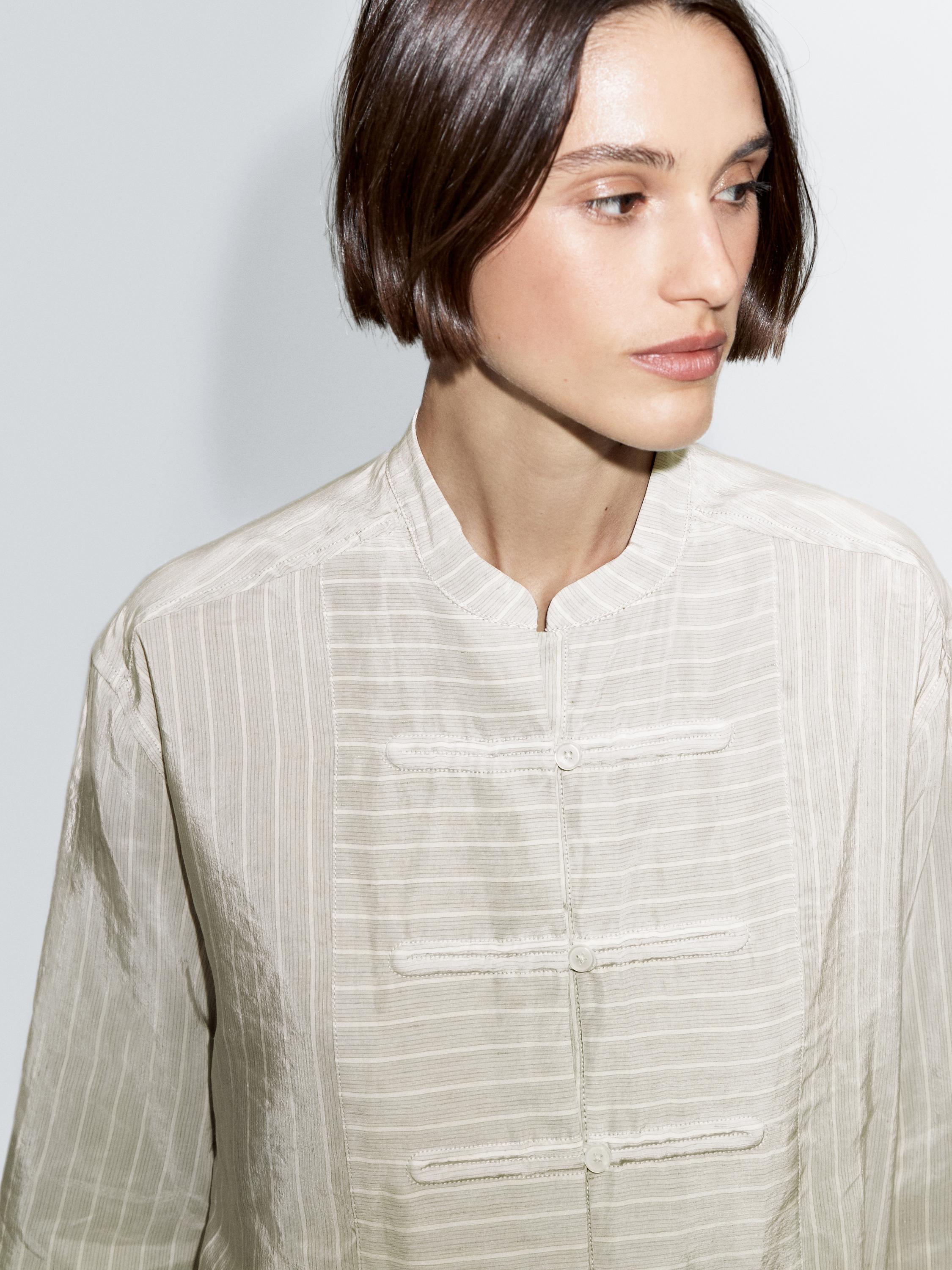 Striped oversize blouse with stand collar